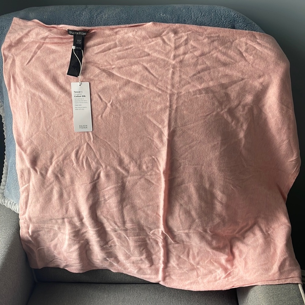 Eileen Fisher cozy poncho cover in pink.